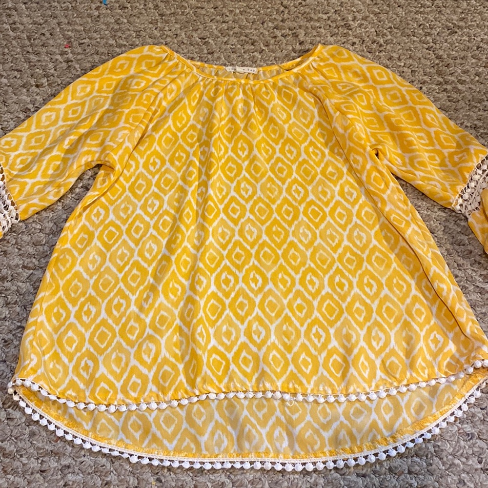 Yellow and white medium cut blouse